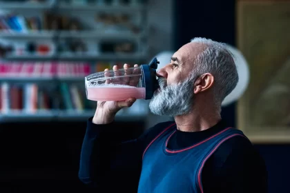 senior man drinking protein shake for muscle health