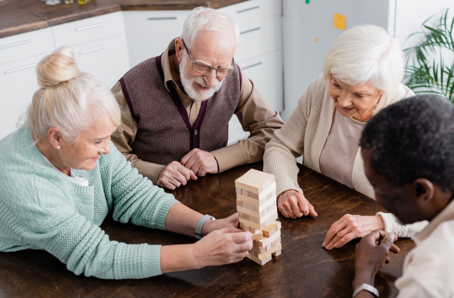 Seniors socializing in a retirement community - types of senior living communities