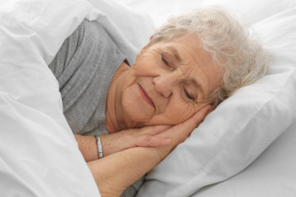 Elderly woman sleeping peacefully - best sleep aids for seniors